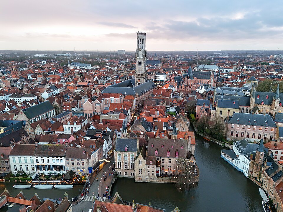 The Belfry rising beyond the Dijver canal, seen from above