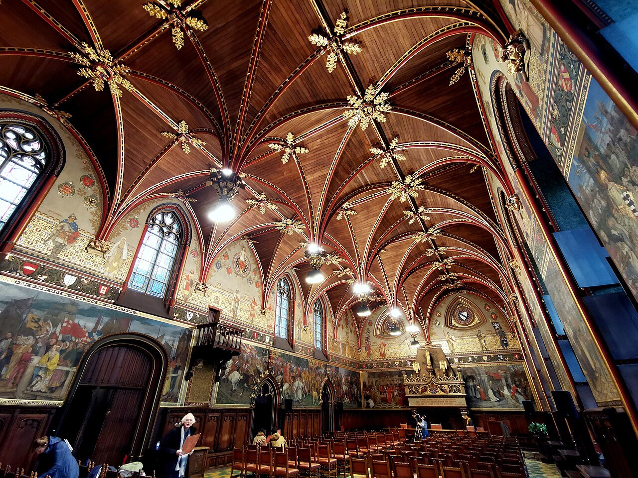 The Gothic Hall of the City Hall, its vaulted timber ceiling hung with gilded pendants
