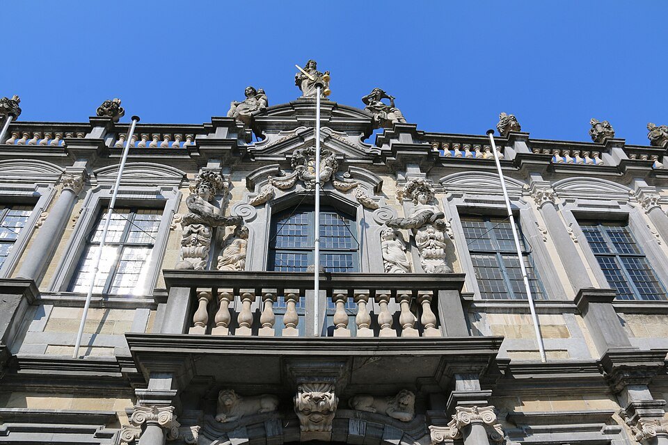 Statues and carved stonework over the windows of the Provost's House