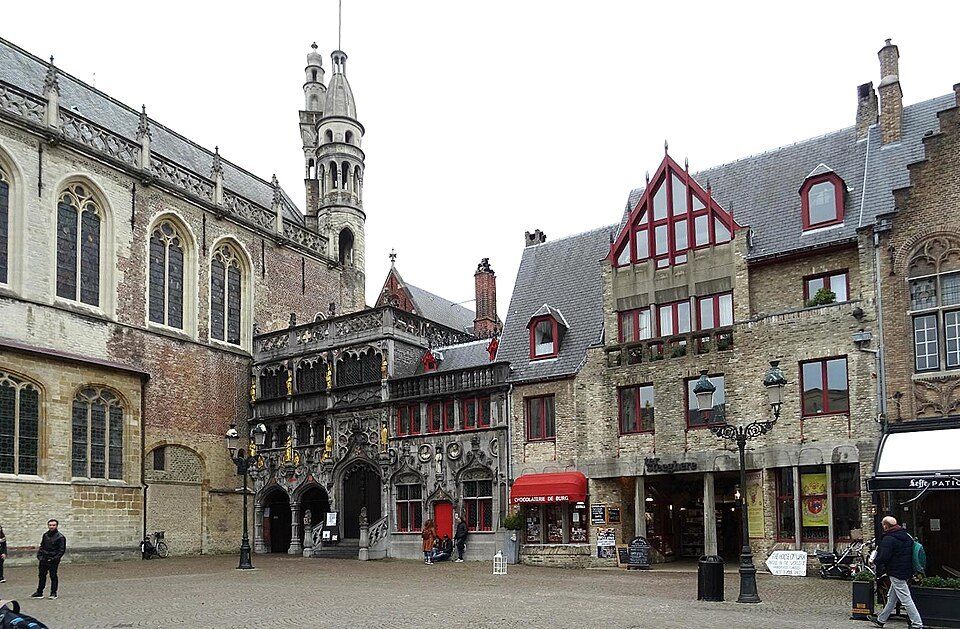 The corner of the Burg with the carved front of the Basilica of the Holy Blood