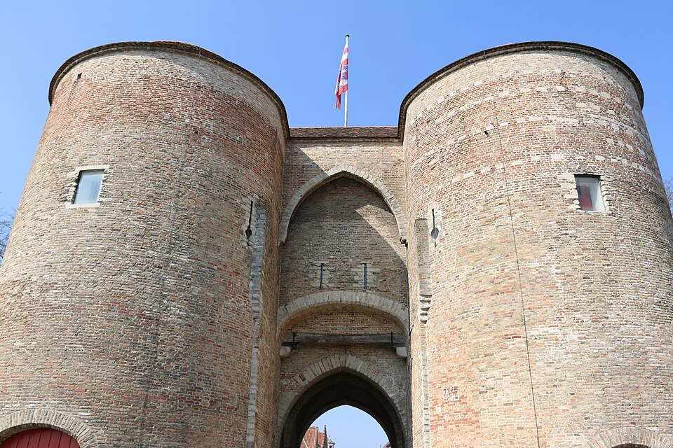 Looking up at the round brick towers of the Gentpoort