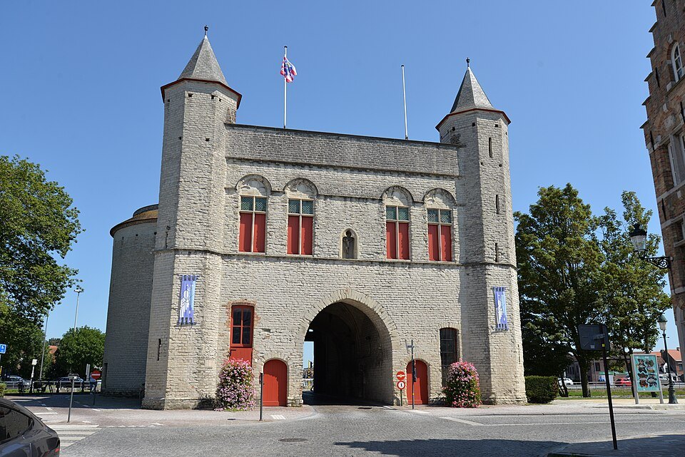 The town side of the Kruispoort, a square stone front with two pointed turrets