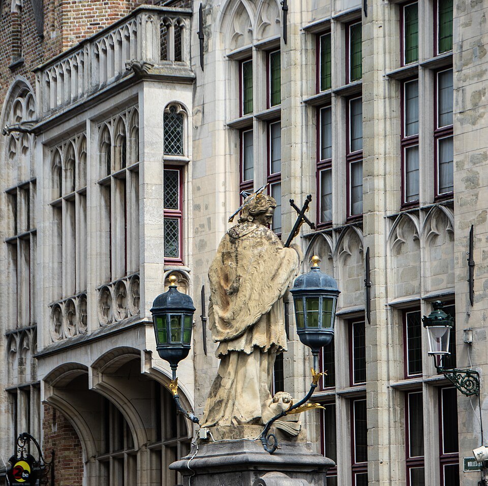 The statue of St. John of Nepomuk on the bridge, lanterns beside him