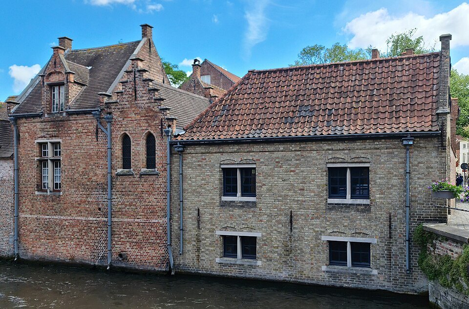 Brick houses rising from the water on the Zonnekemeers