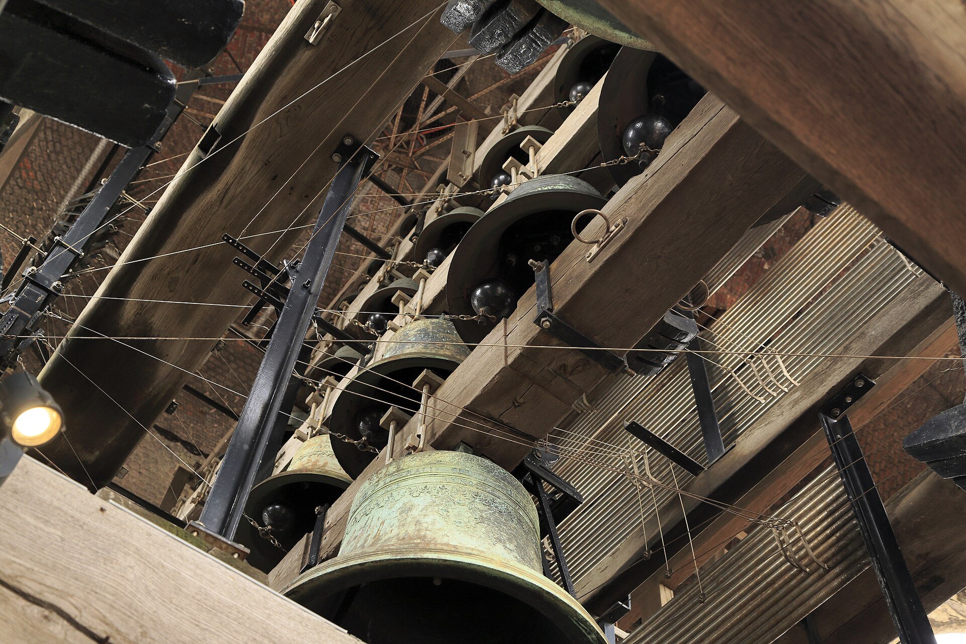 Bells hanging in the timber frame of the Belfry