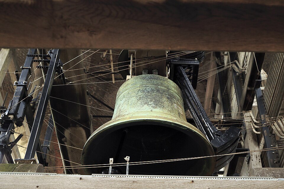 A bronze bell of the carillon in the Belfry
