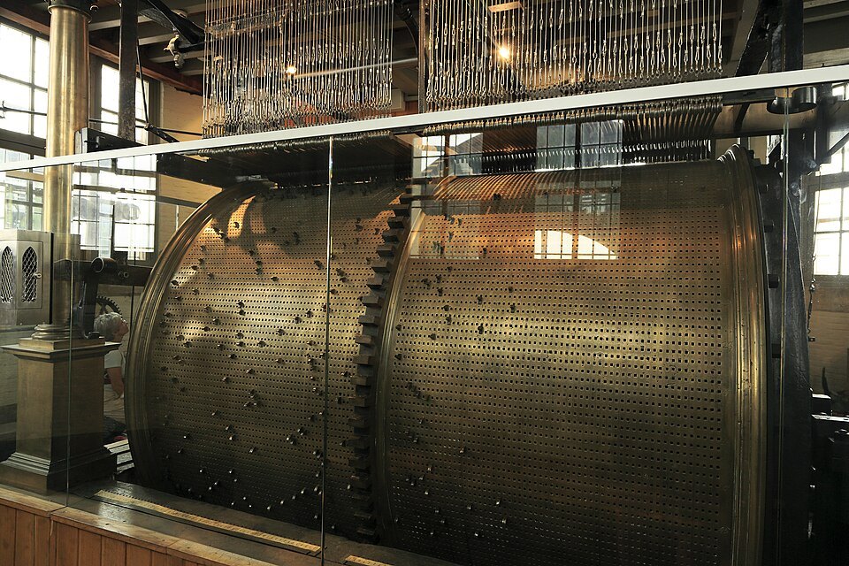 The carillon drum behind glass in the Belfry