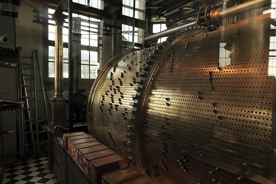 The carillon drum beside the tall windows of the tower room
