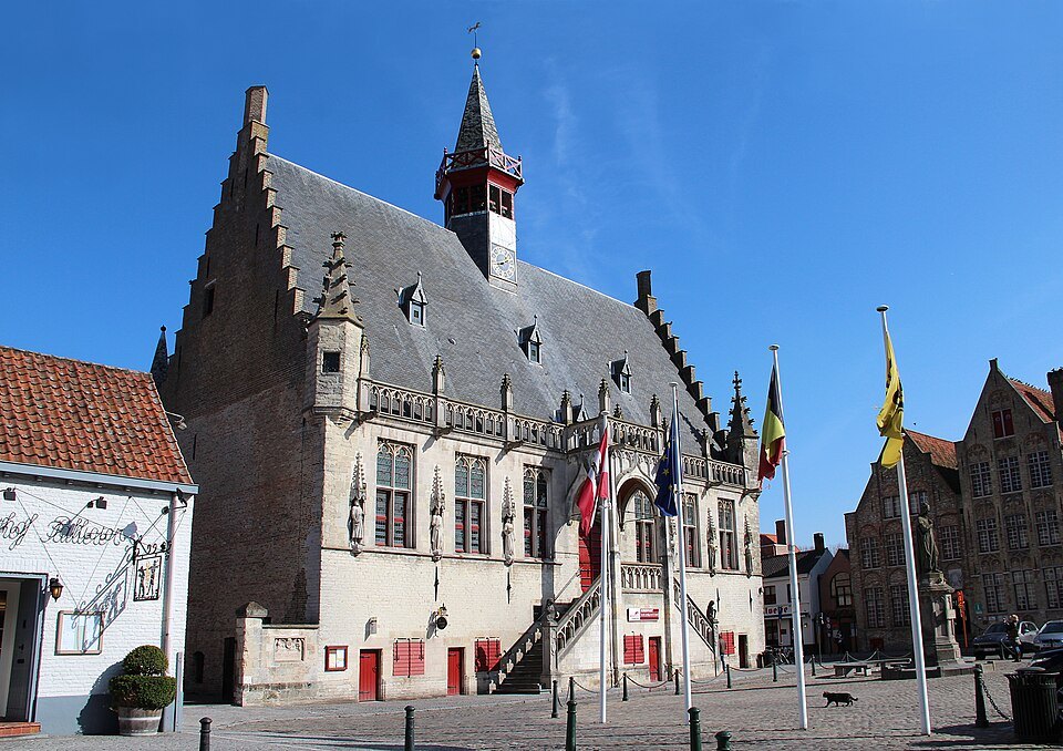 Damme town hall with its turrets and flags