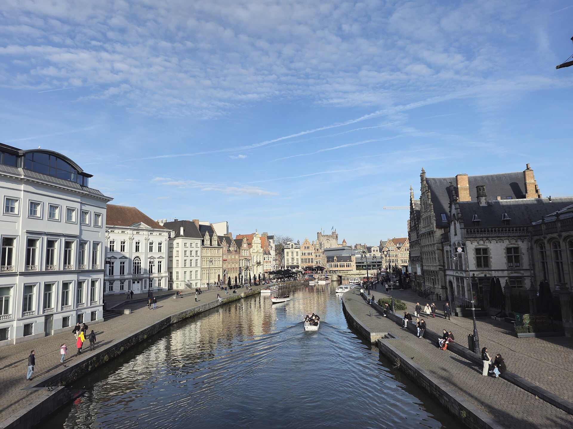The Graslei and Korenlei quays in Ghent under a blue sky