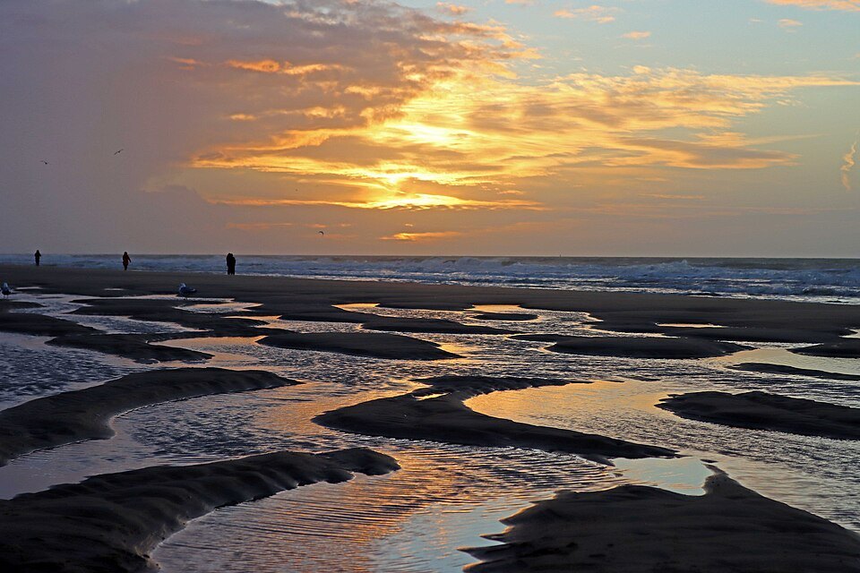 The beach at Ostend at low tide under an evening sky