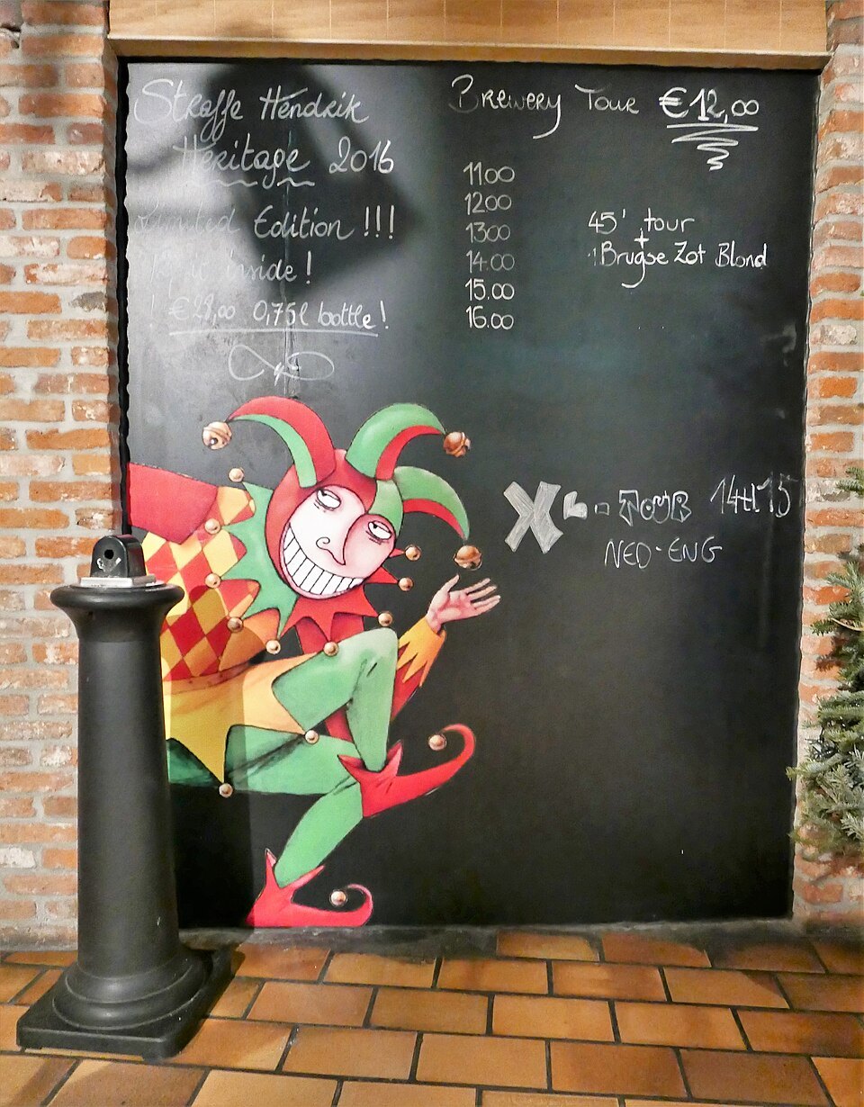 A jester painted beside a blackboard at the brewery
