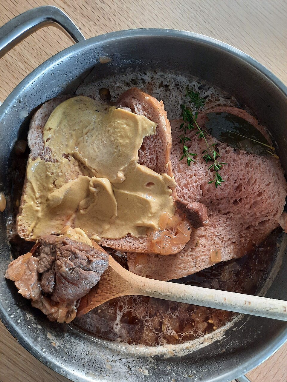 Flemish stew cooking in a pot
