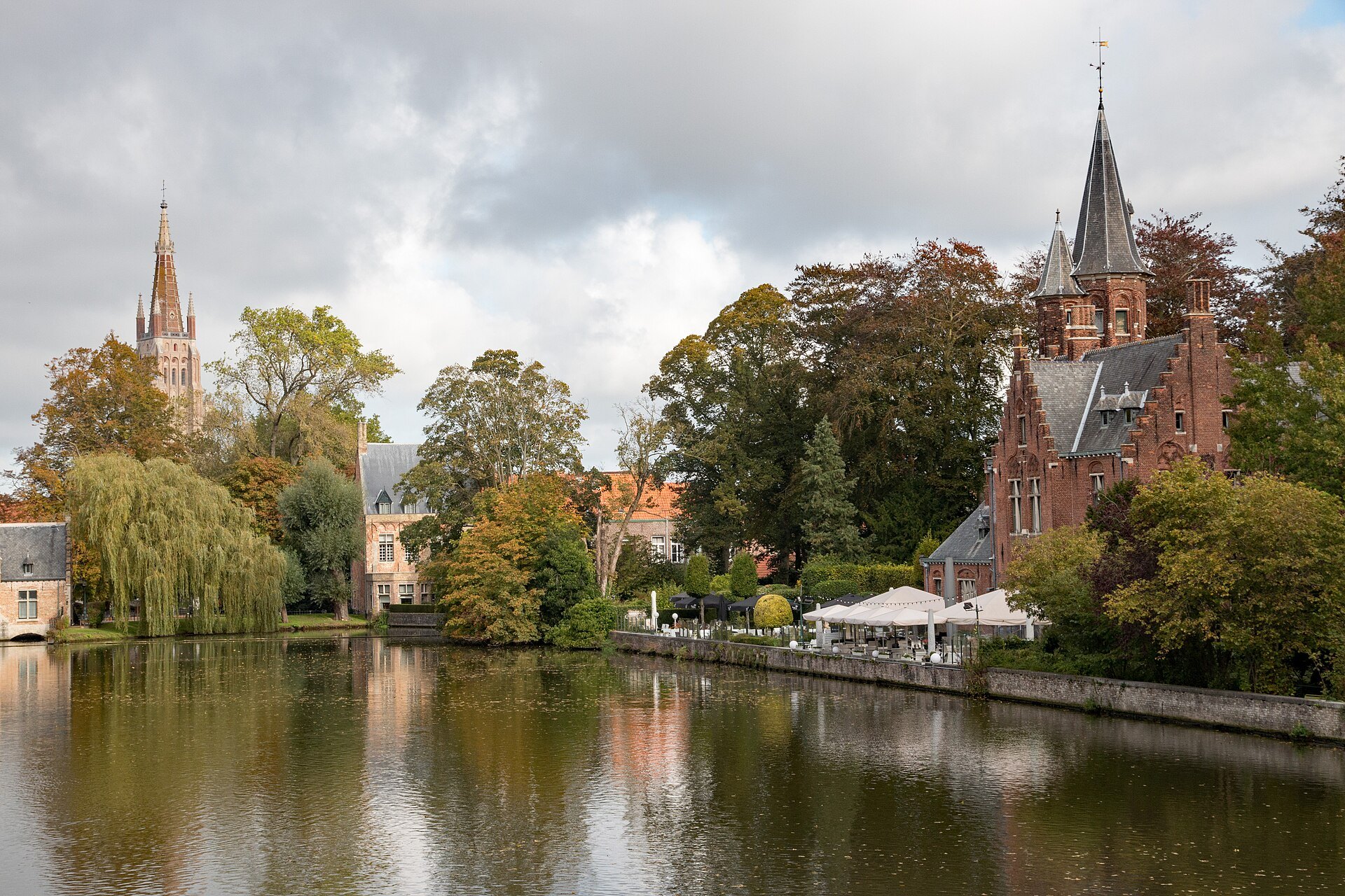 The Minnewater and Kasteel de la Faille, the spire of Our Lady beyond