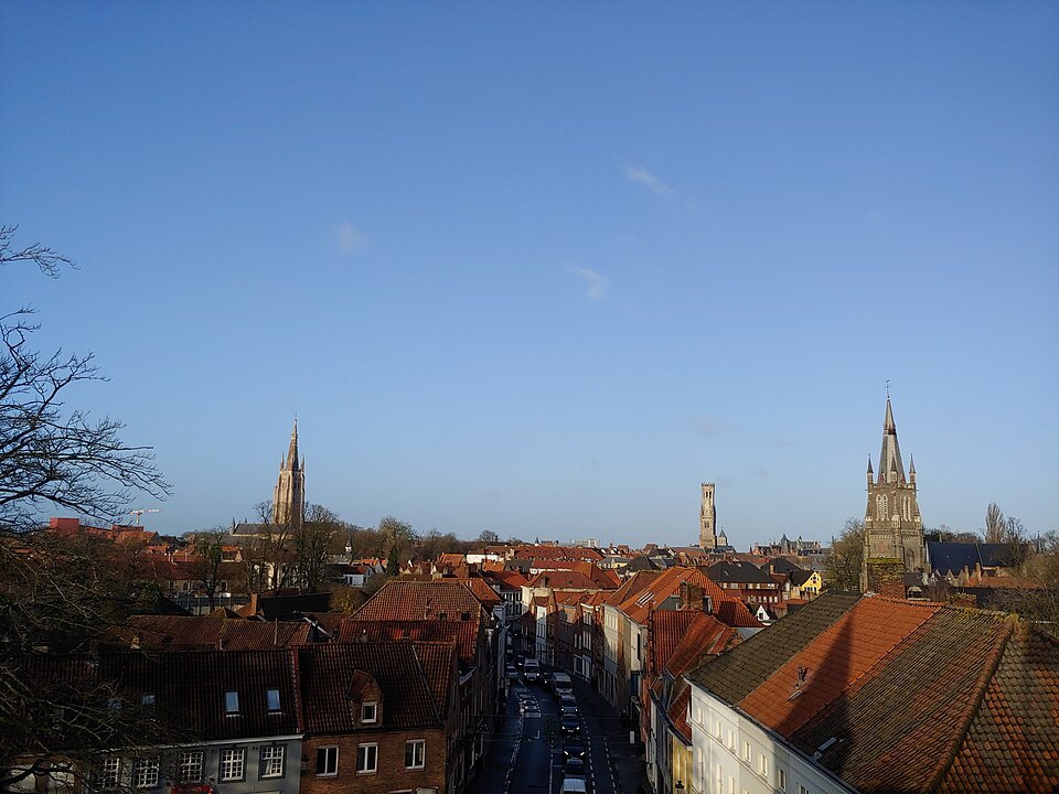 The towers of Bruges from the Gentpoort on a clear winter day