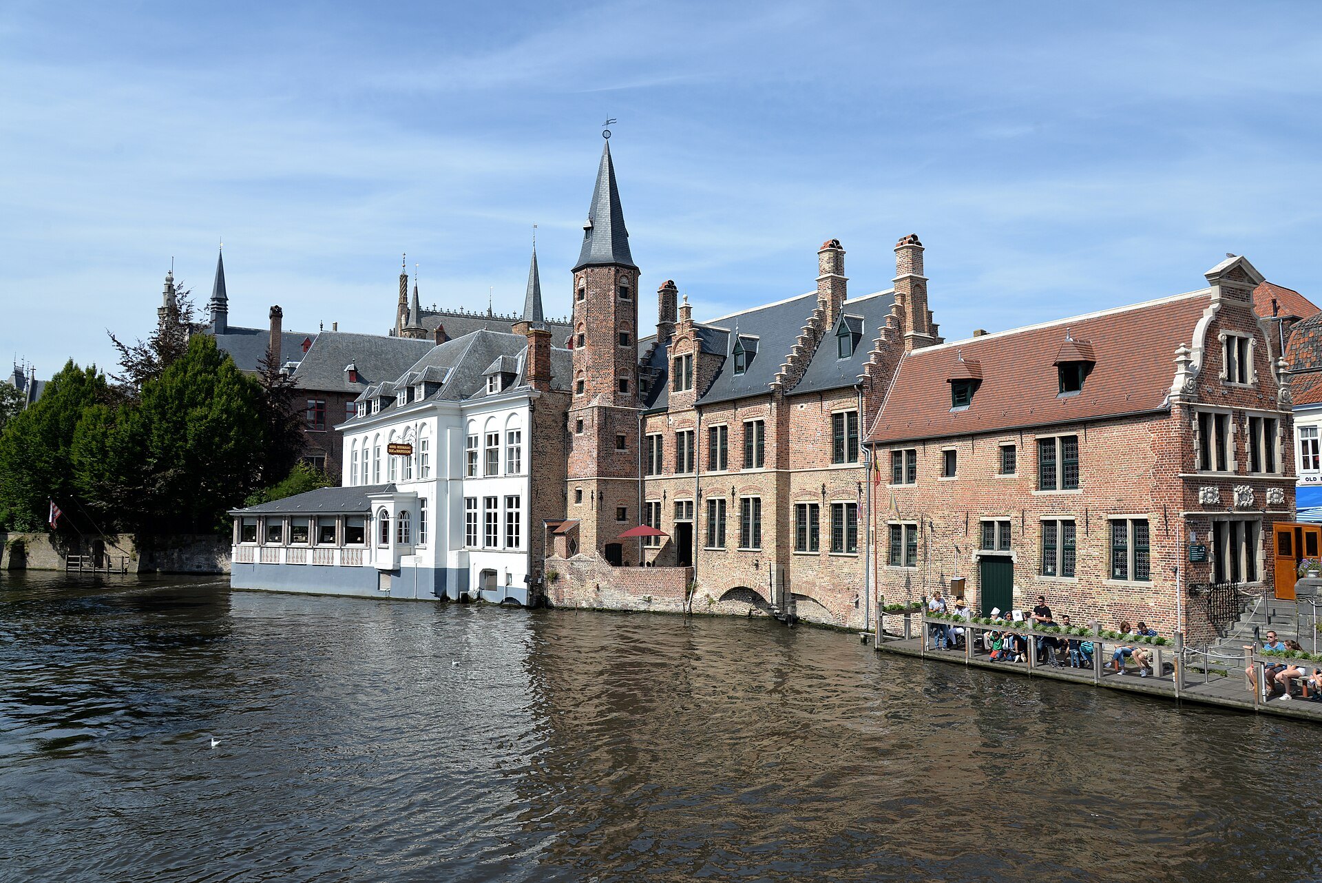 The Dijver's white and brick houses reflected in the canal