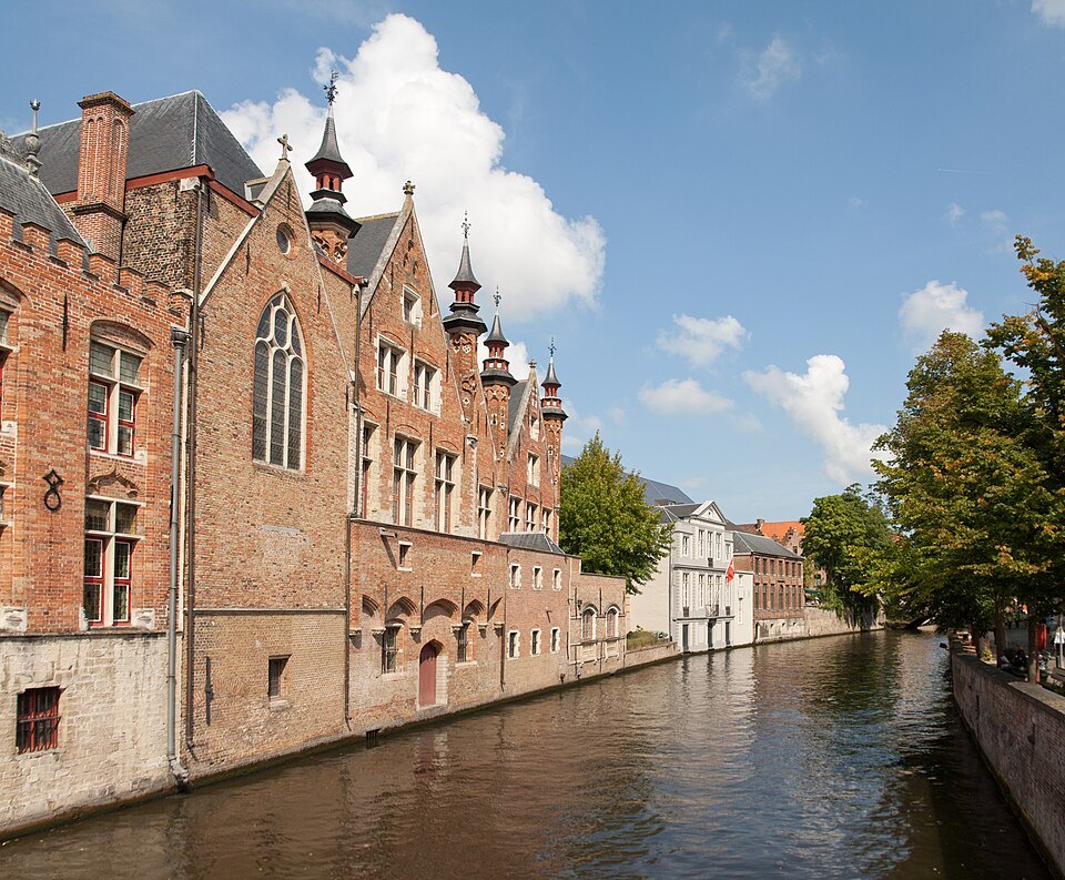 The rear of the Liberty of Bruges rising straight from the canal