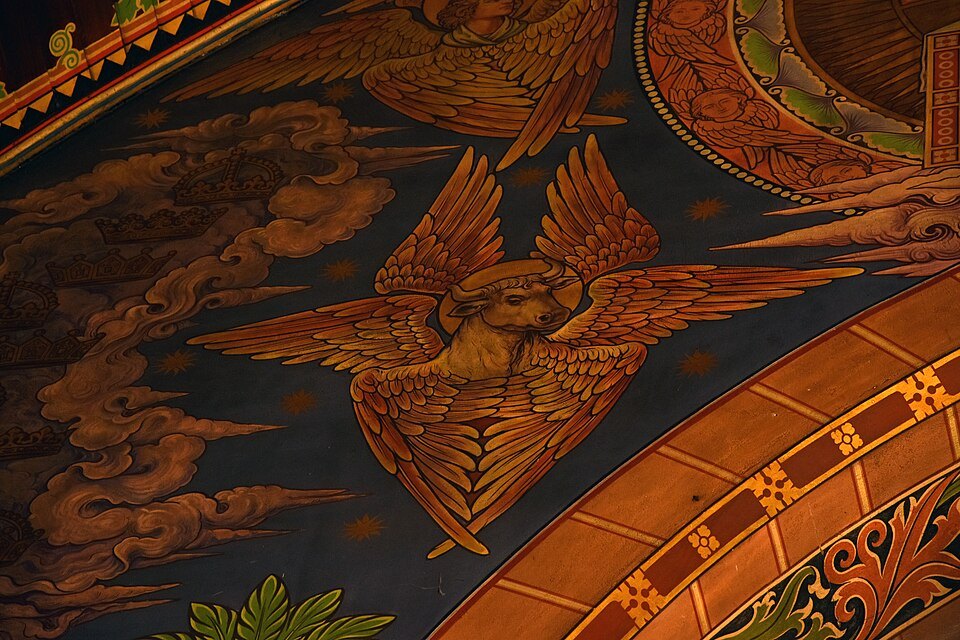 A winged figure painted on the vault of the upper chapel