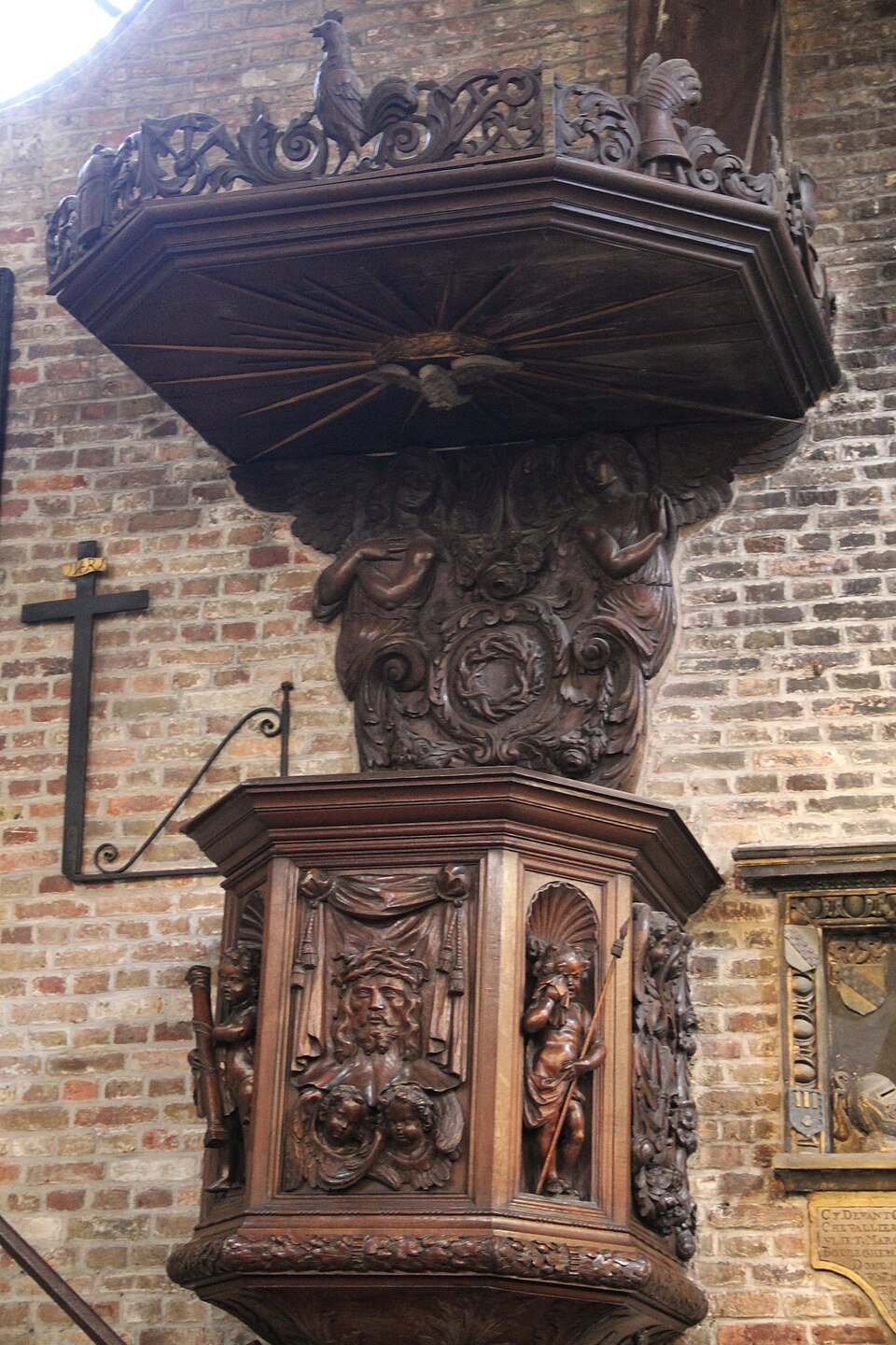 A carved wooden pulpit in the church