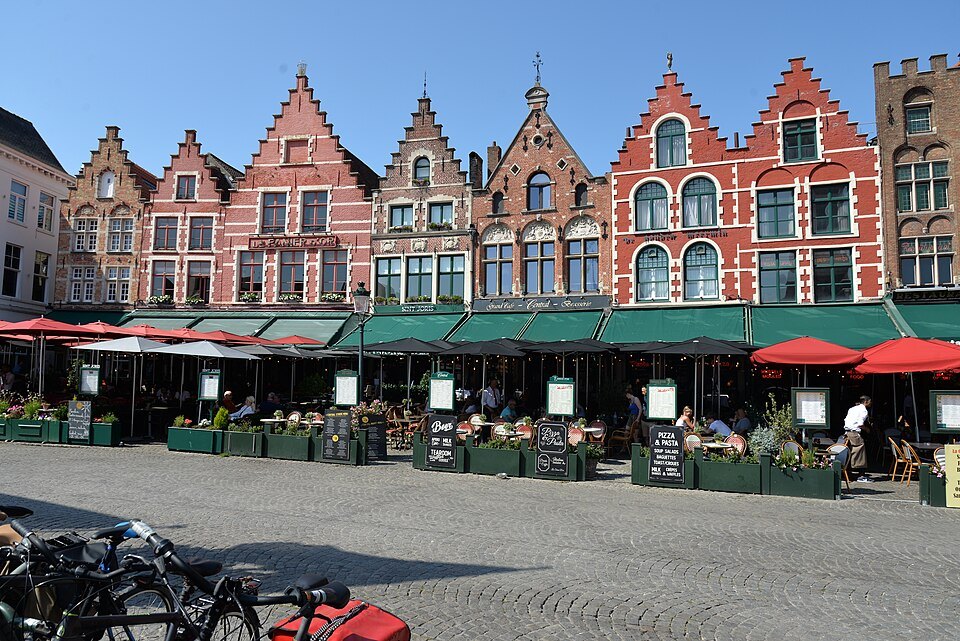 The stepped and gabled houses on the north side of the Markt above their café terraces