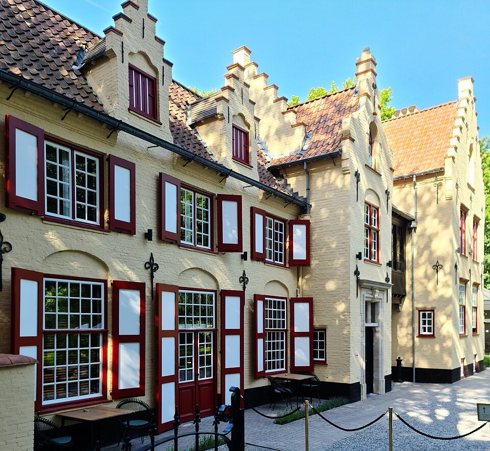 Gabled houses with red shutters on the street called Minnewater