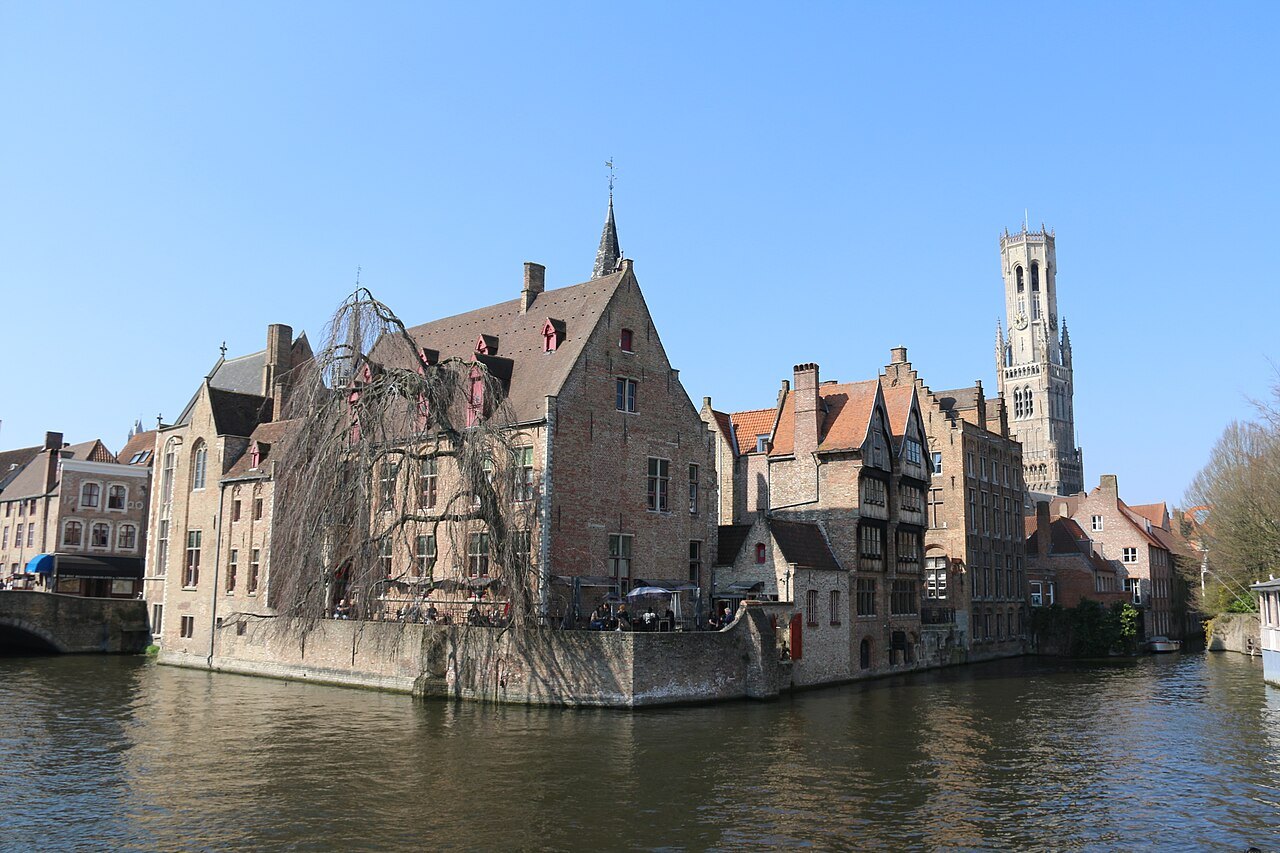 The Rozenhoedkaai bend with the Belfry above the brick houses