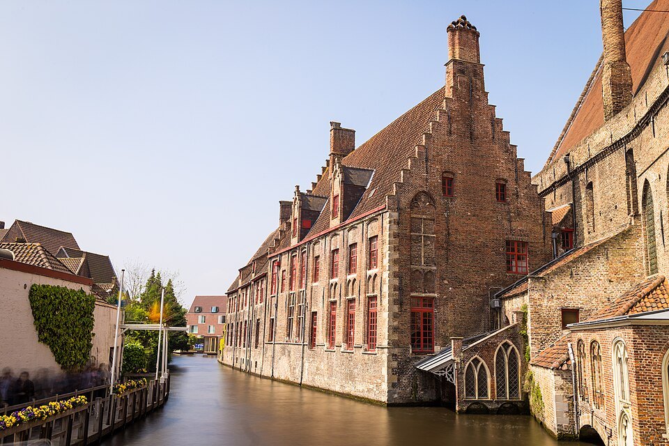 St. John's Hospital along the still canal, with no boats in sight