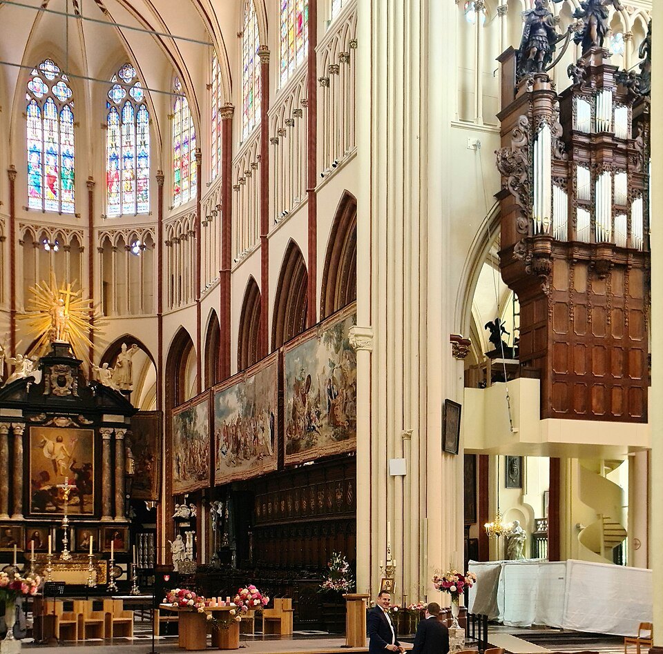 The organ case and a tapestry beside the choir